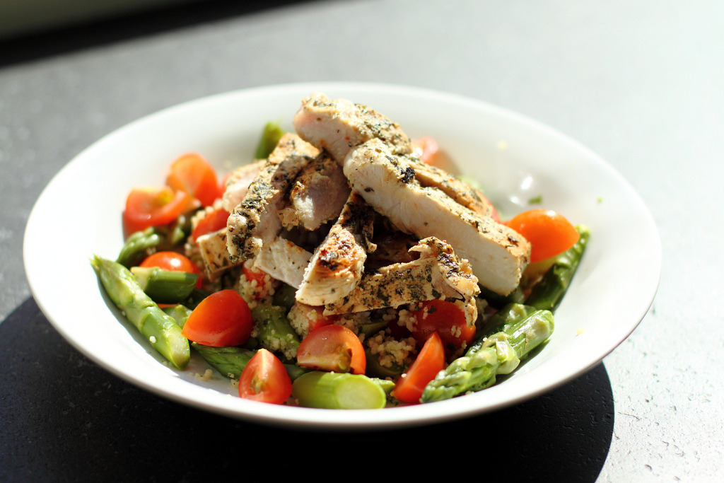 Chicken over asparagus and tomato couscous (by kimwassenaar)
