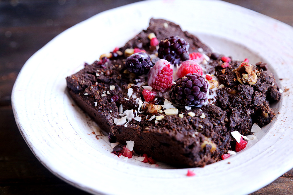 Chocolate Pudding Cake with Berry and Coconut Topping