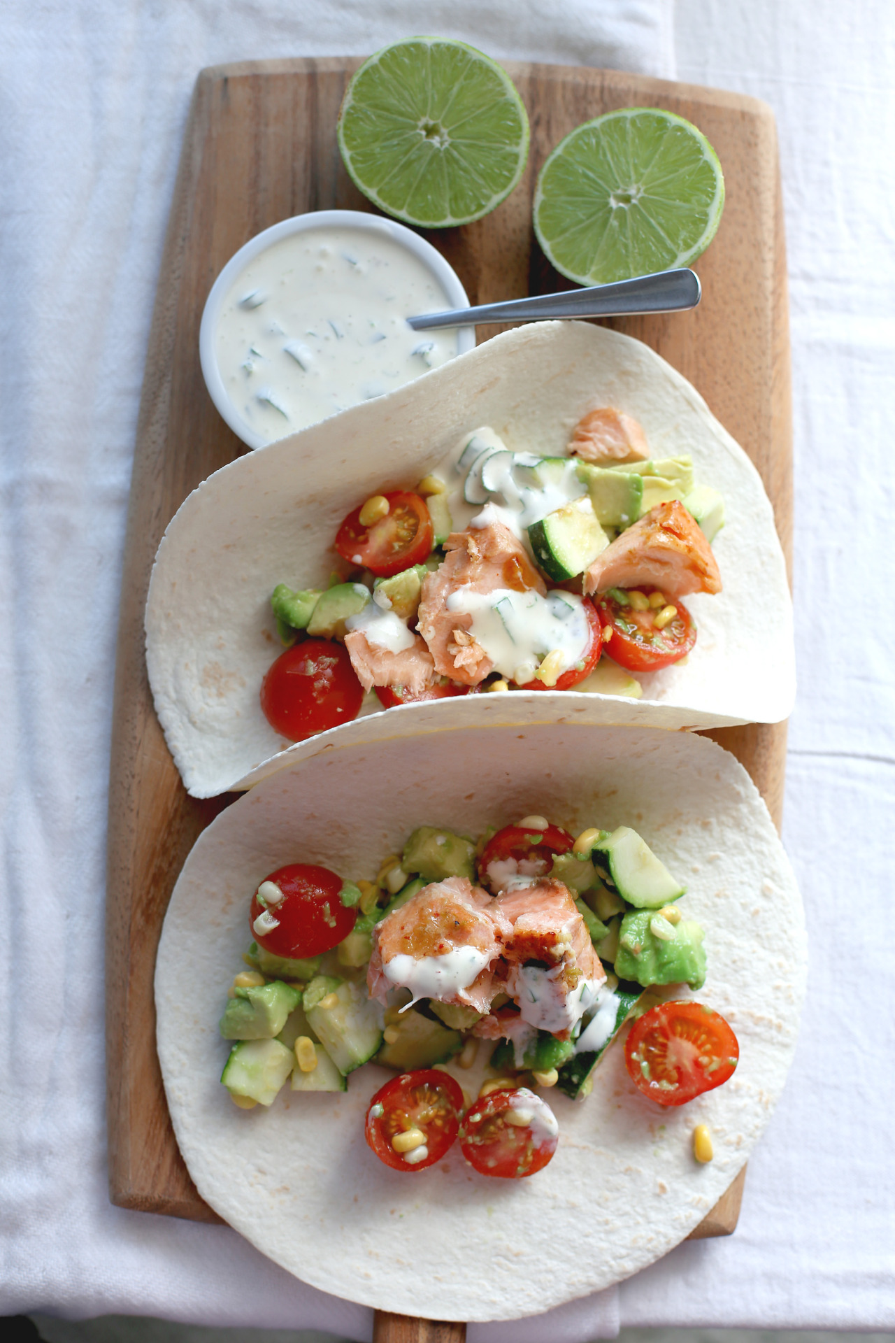 Spicy Salmon Soft Tacos with Avocado, Cherry Tomato, and Corn Salsa